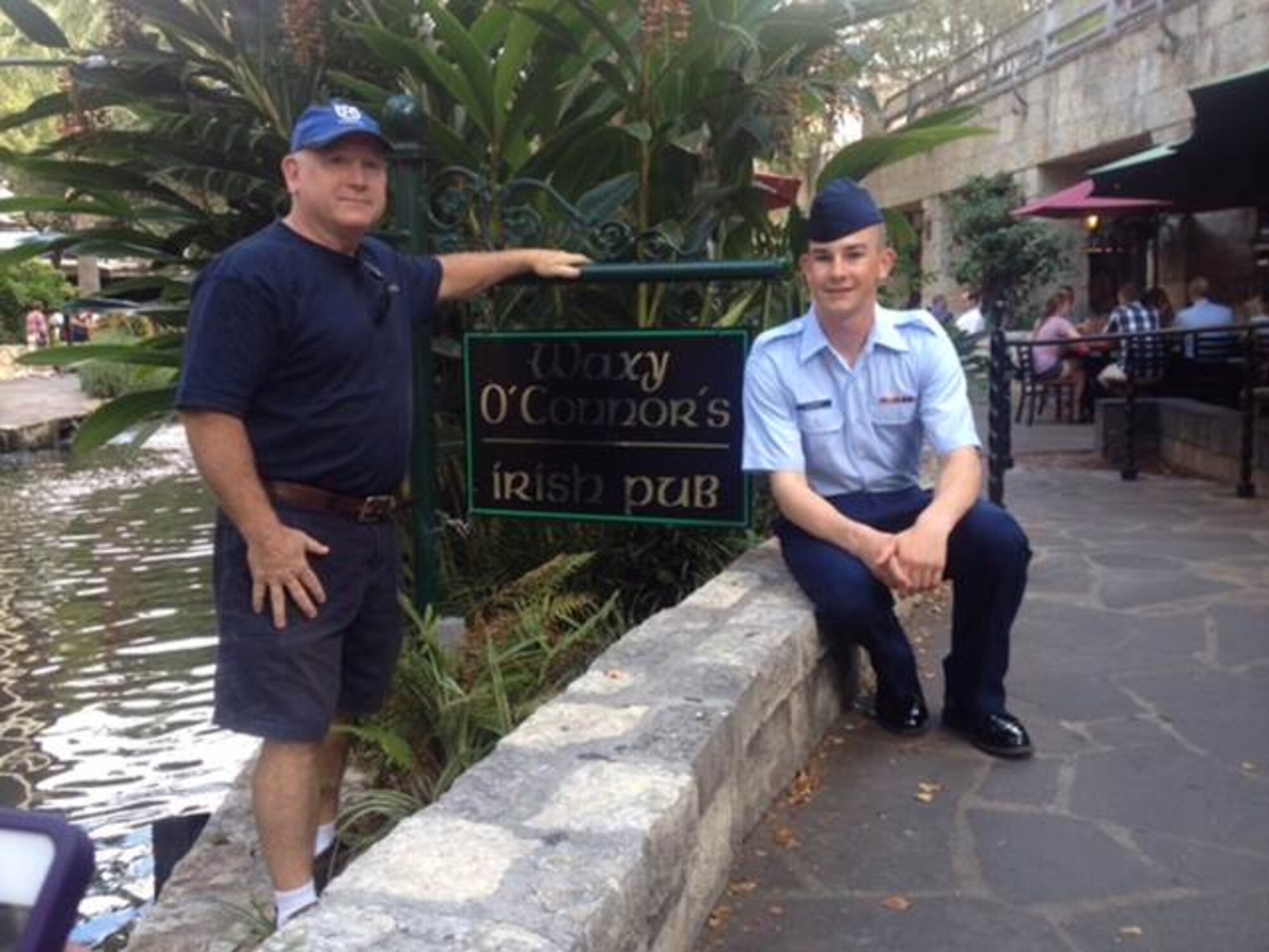 Airman Basic Michael O’Connor spends the day with his dad, Carl O’Connor, Sept. 28, 2013, at the River Walk in San Antonio, Texas. O’Connor graduated Basic Military Training and attended Technical School for paralegal studies at Maxwell Air Force Base, Alabama. (Courtesy photo)