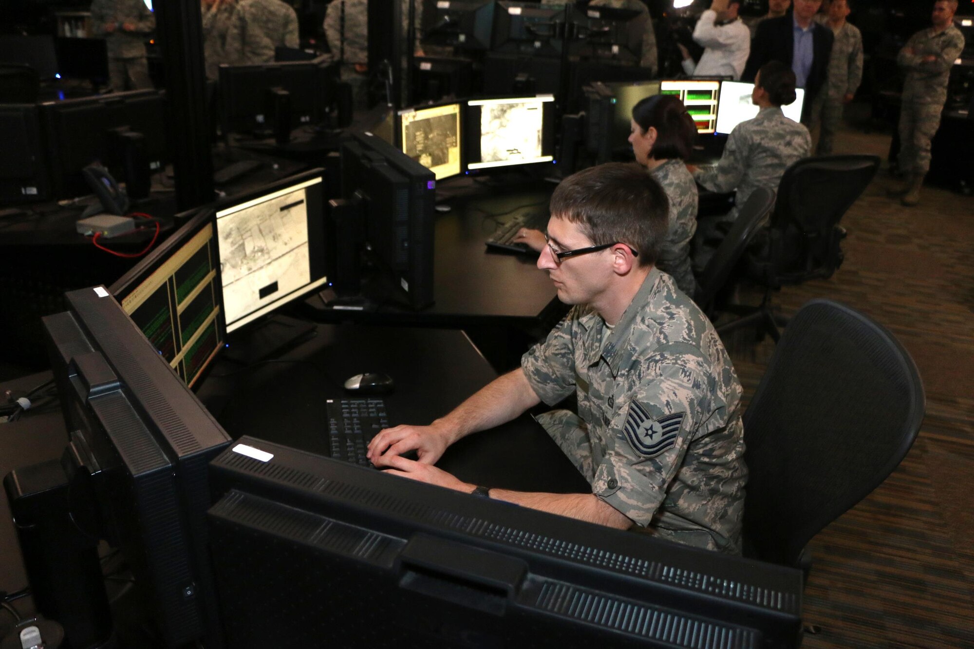 A Virginia National Guard Airman from the 192nd Intelligence Squadron demonstrates some of the intelligence, surveillance and reconnaissance capabilities they use to support operations across the globe March 17, 2015, at Langley AFB. 
