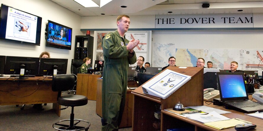 The 2015 Honorary Commanders tour the 436th Airlift Wing staff agencies Feb. 25, 2015, at Dover Air Force Base, Del. The honorary commanders received briefings at each agency they visited and had the opportunity to participate in hands-on training scenarios. (U.S. Air Force photo/Roland Balik)
