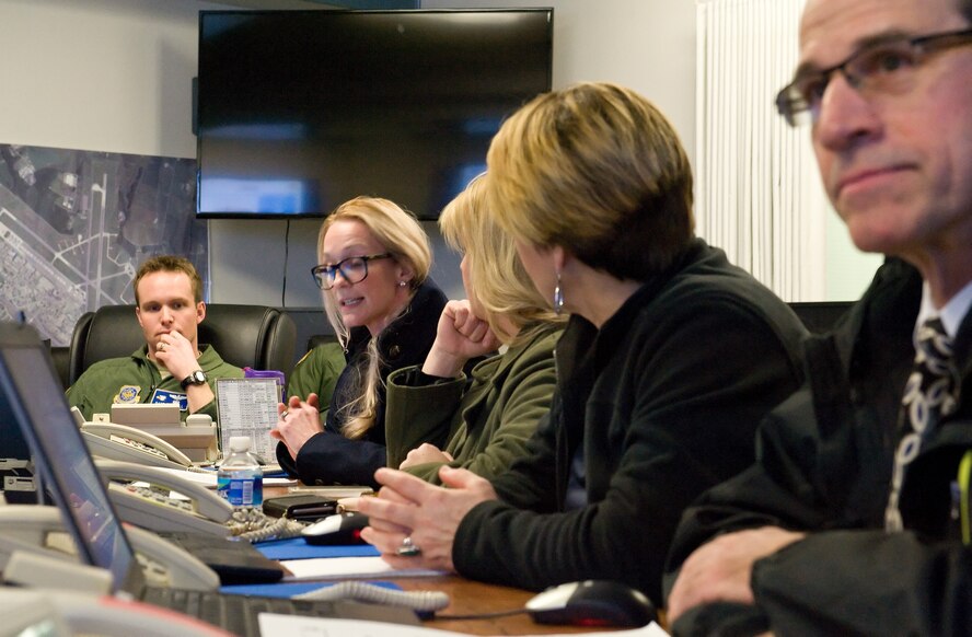 The 2015 Honorary Commanders tour the 436th Airlift Wing staff agencies Feb. 25, 2015, at Dover Air Force Base, Del. The honorary commanders received briefings at each agency they visited and had the opportunity to participate in hands-on training scenarios. (U.S. Air Force photo/Roland Balik)