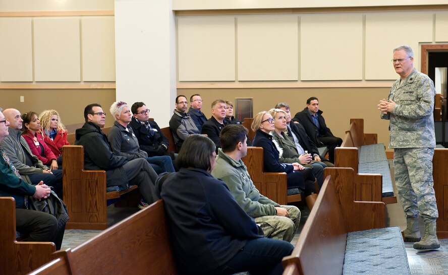 The 2015 Honorary Commanders tour the 436th Airlift Wing staff agencies Feb. 25, 2015, at Dover Air Force Base, Del. The honorary commanders received briefings at each agency they visited and had the opportunity to participate in hands-on training scenarios. (U.S. Air Force photo/Roland Balik)