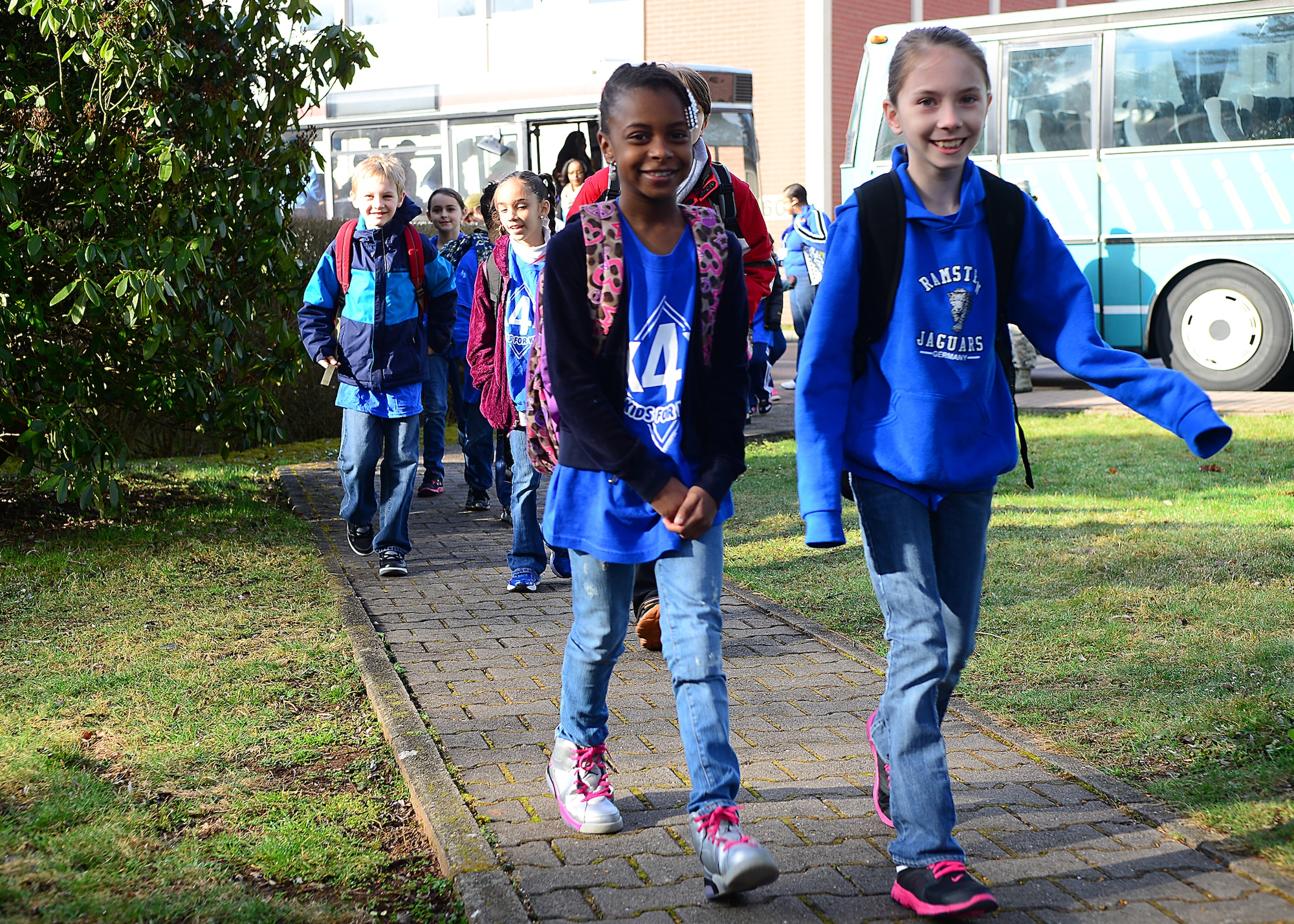 Ramstein Intermediate School students arrive to process a mock pre-deployment line held on the 435th Air Ground and Operations Wing, 435th Construction and Training Squadron’s silver flag compound, March 27, 2015.  Ramstein units came together and gave RIS students the opportunity to deploy like their Airmen and Soldier parents. (U.S. Air Force photo/Tech. Sgt. Daylena S. Ricks)