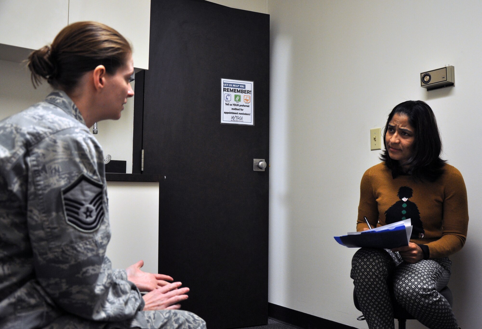 Master Sgt. Amy C. Dotson, 316th Training Squadron instructor, talks with Dr. Archana N. Rao, West Texas Medical Associates neurologist, at the WTMA March 9. Dotson discussed her feelings and challenges about dealing with fibromyalgia and multiple sclerosis. (U.S. Air Force photo by Senior Airman Joshua D. Edwards)
