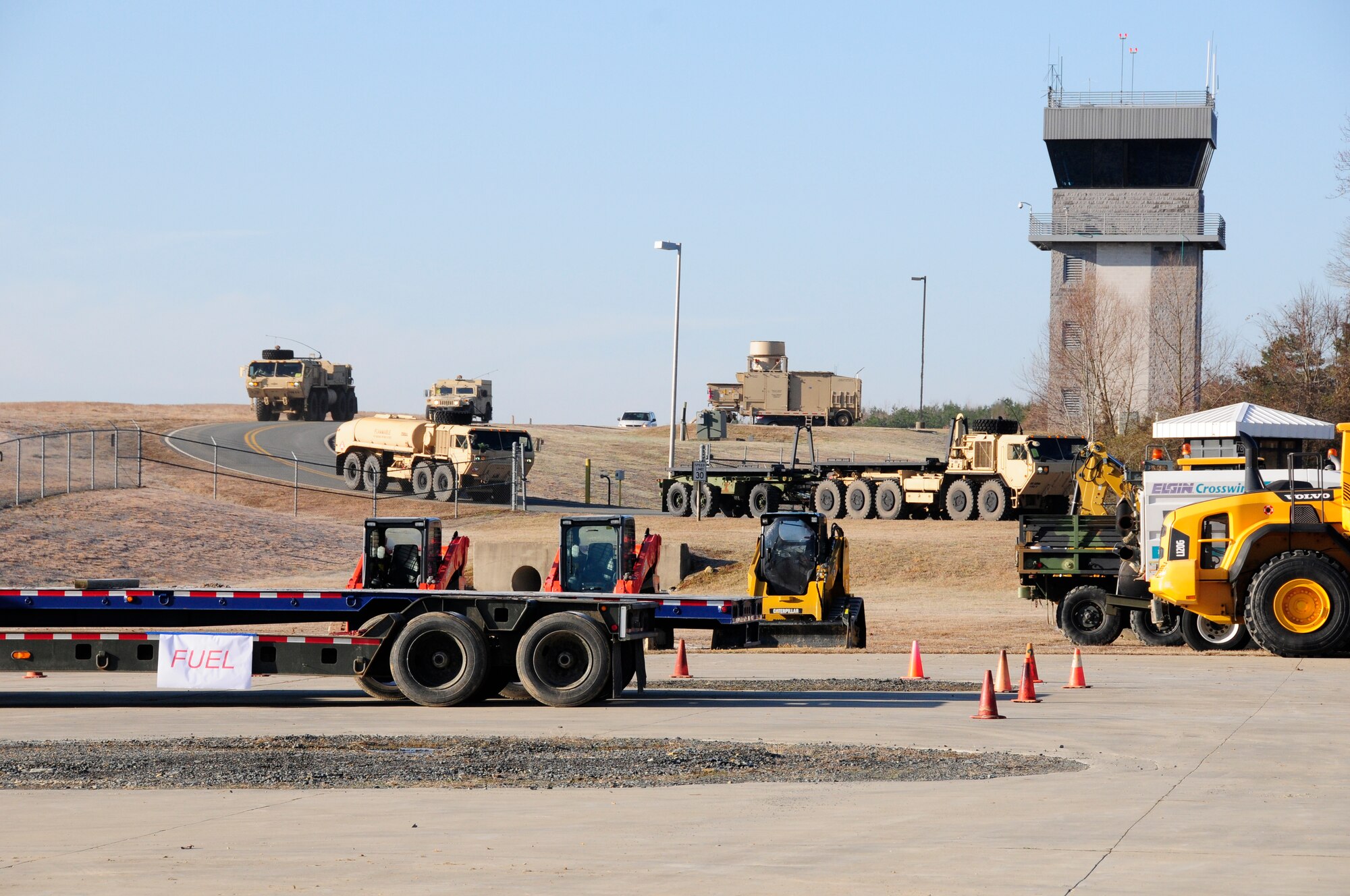 U.S. Army National Guard soldiers, arrive by convoy to the 145th Civil Engineer Squadron-Regional Training Site, New London, N.C., March 7, 2015, to participate in Vigilant Guard 2015. Vigilant Guard is an exercise program that provides an opportunity for Army and Air National Guard, North Carolina Emergency Management, and county civilian partners in order to respond effectively to natural disasters. (U.S. Air National Guard photo by Master Sgt. Patricia F. Moran, 145th Public Affairs/Released) 
