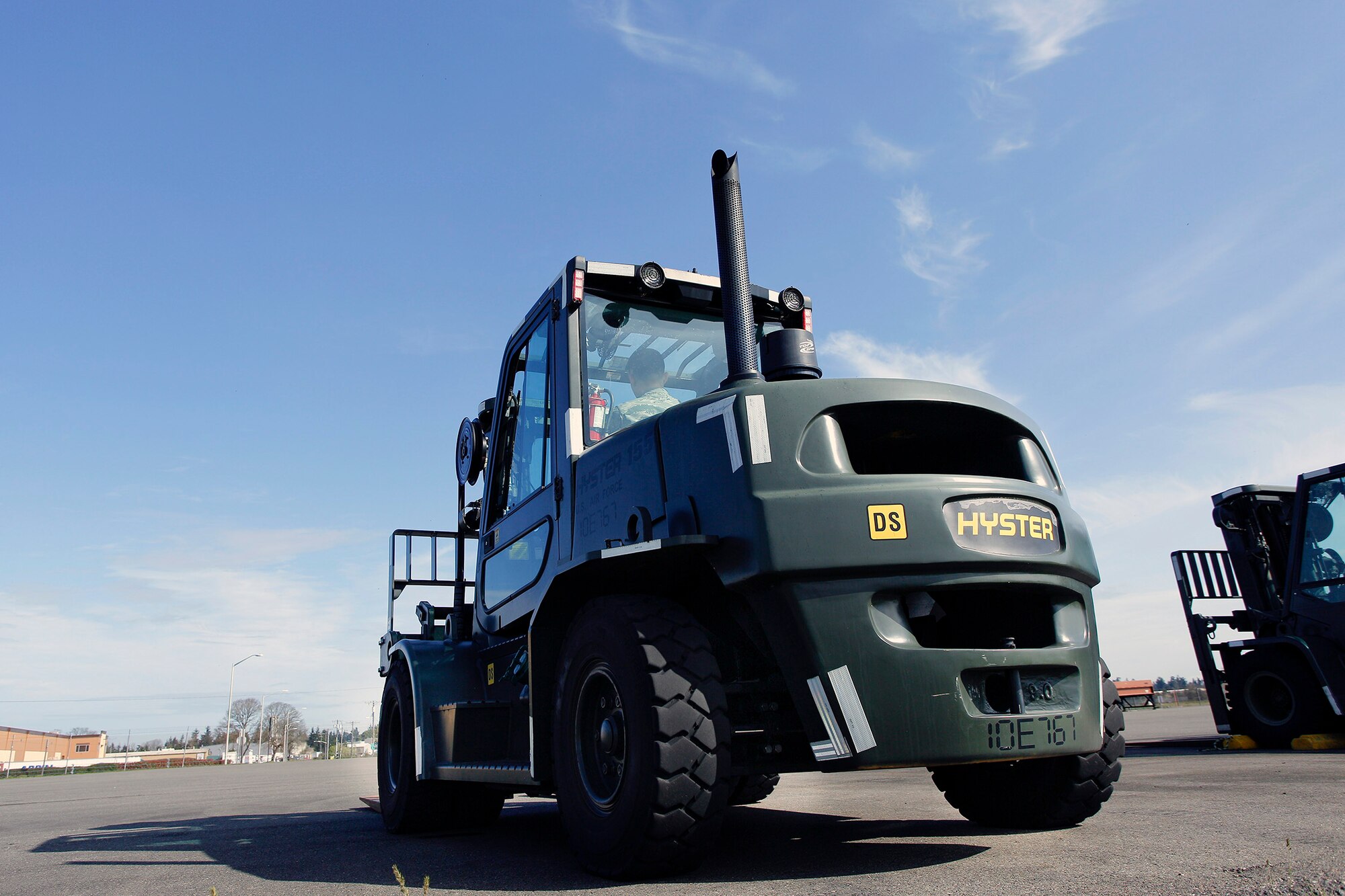 Airman 1st Class Will Akers, 86th Aerial Port Squadron cargo specialist, prepares to operate a 10K forklift March 27 as part of his air transportation specialist on-the-job-training requirements. The 10K forklift is one of the primary pieces of equipment used by air transportation specialists.(U.S. Air Force Reserve photo by Jake Chappelle)