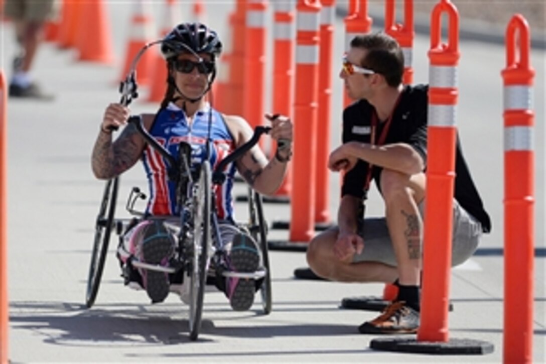Army Staff Sgt. Monica Martinez awaits the starting call for her victory ride in the women’s hand cycle event during the Army Trials for the 2015 DoD Warrior Games on Fort Bliss in El Paso, Texas, March 29, 2015.