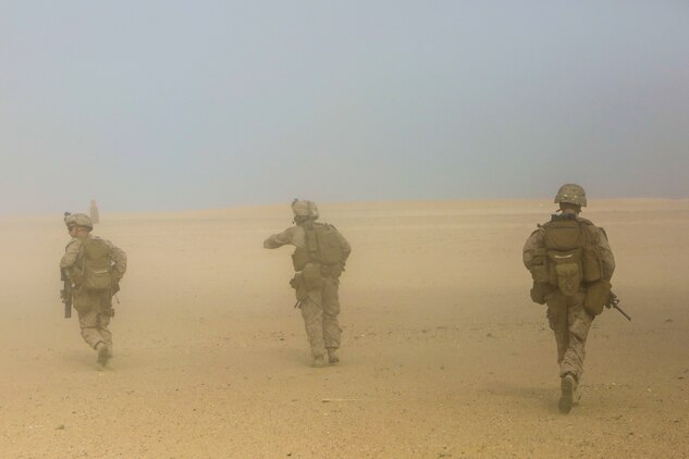U.S. Marines with 2nd Battalion, 7th Marine Regiment, Special Purpose Marine Air Ground Task Force – Crisis Response – Central Command, sprint off an MV-22 Osprey tiltrotor aircraft during a Tactical Recovery of Aircraft and Personnel drill in the Central Command area of operation, March 8, 2015. TRAP missions are conducted by teams of Marines and sailors to rescue or extract downed personnel or aircraft in the event of an in-flight emergency during combat operations. (U.S. Marine Corps photo by Cpl. Tony Simmons/Released)