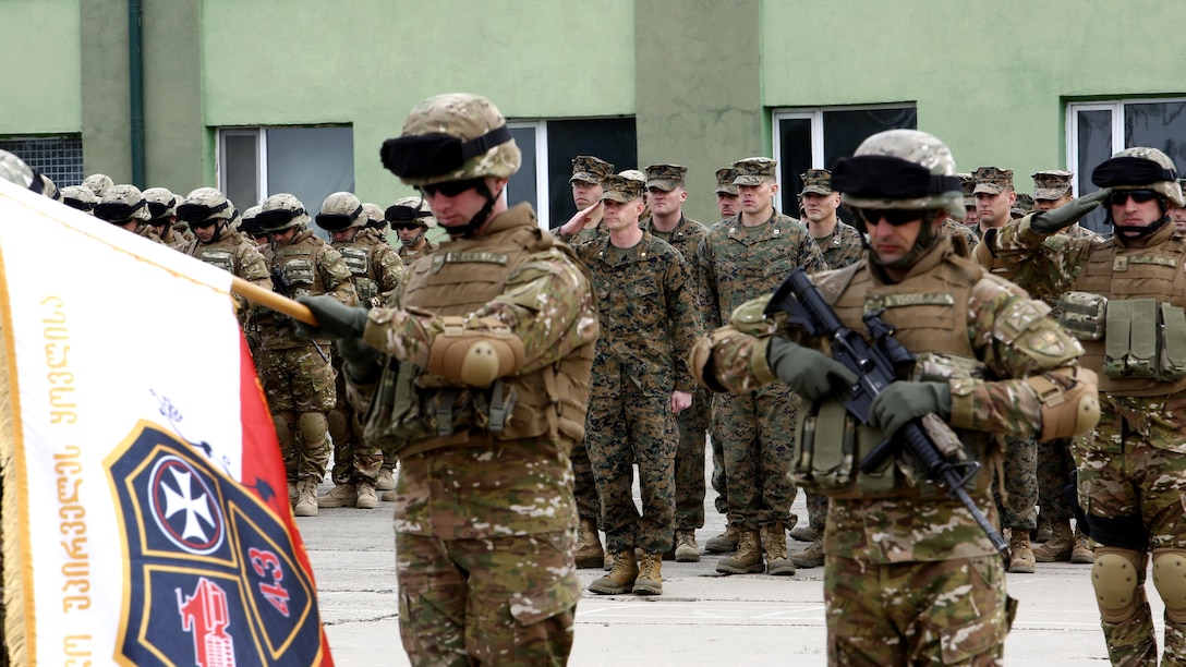 The Georgian 43rd Light Infantry Battalion are the feature of the departure ceremony on March 24 at Vaziani Training Area, Georgia, as they, along with U.S. Marine advisors, deploy to contribute to NATO’s Resolute Support in Afghanistan. The U.S. Marines and Georgian soldiers have trained together since October as part of the Georgia Deployment Program.