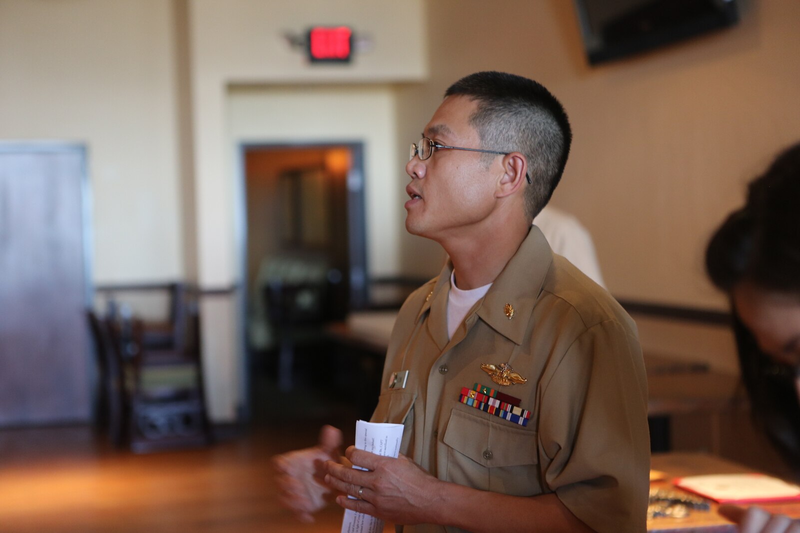Lt. Cmdr. Vinh T. Ton, dentist for 1st Dental Battalion, speaks after receiving the Weedon E. Osborne Award following a ceremony at Pacific Views Event Center aboard Camp Pendleton, Calif, March 27, 2015. The award is earned by a dental officer who makes significant contributions to operational readiness. It is presented annually by the Marine Corps Association. The award is named in honor of Lt. j.g. Weedon E. Osborne, Dental Corps, U.S. Navy, who was killed in action during the battle of Belleau Wood in France in 1918. “When I reflect upon the pool of other extraordinarily dedicated and talented practitioners nominated for this award, words cannot express the depth of my humility for having been chosen for this honor,” said Ton. “I would like to share the honor of this award with all those who were also nominated, truly any of you could have been selected for this award.”