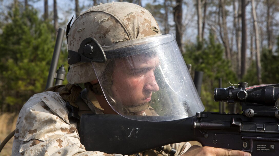 Lance Cpl. Brandon D. Tompkins, an artilleryman with Echo Battery, 2nd Battalion, 6th Marine Regiment participates in a live-fire, non-lethal weapons training exercise aboard Marine Corps Base Camp Lejeune, N.C. March 27, 2015. The Marines conducted a two week training course in preparation for an upcoming deployment.