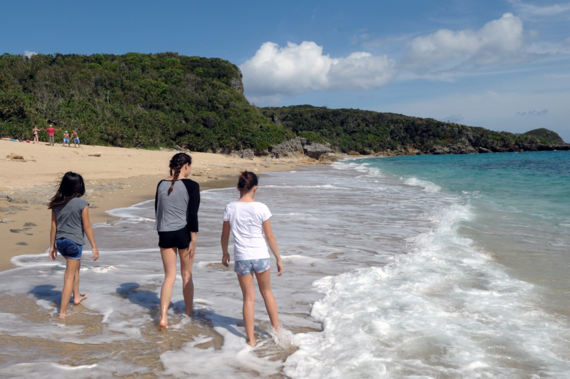 Visitors walk the short length of this beach on the far east side of Hamahiga Island during a March 28, 2015, visit. The beach, about a 30-minute drive from Kadena Air Base, Japan, is accessible via a small path near the Takaesu Salt Factory.