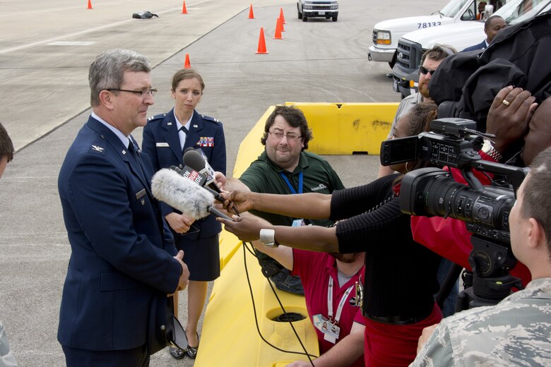 Colonel Robert Scott Grants, 117th Air Refueling Wing Vice Commander speaks to the local media during President Barack Obama's visit to Birmingham Alabama. The President came to Birmingham to visit Lawson State Community College where he gave a speech on economic issues. (U.S. Air National Guard photo by: Senior Master Sgt. Ken Johnson/Released)