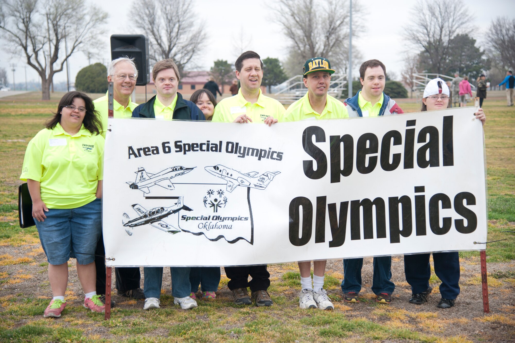VANCE AIR FORCE BASE, Okla. – The members of Enid High Alumni, led by retired Air Force Maj. George Pankonin, the father of a special Olympian, gather for a photo March 25 during the Area 6 Special Olympics here. This is the 26th year that Vance hosted the Special Olympics. (U.S. Air Force photo\Staff Sgt. Nancy Falcon)