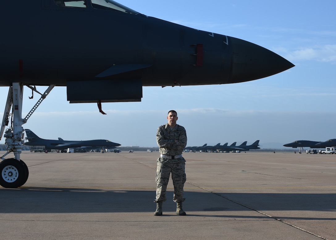 U.S. Air Force Master Sgt. Jonathan Meyer, 9th Bomb Squadron, B-1 Weapons NCO in charge, received the 4th Quarter Outstanding Armament Manager from Air combat Command Mar. 19, 2015, at Dyess Air Force Base. Meyer supervises and performs production checks on explosives that have been loaded onto the B-1B Lancers as part of his daily tasks (U.S. Air Force photo by Airman 1st Class Alexander Guerrero/Released)