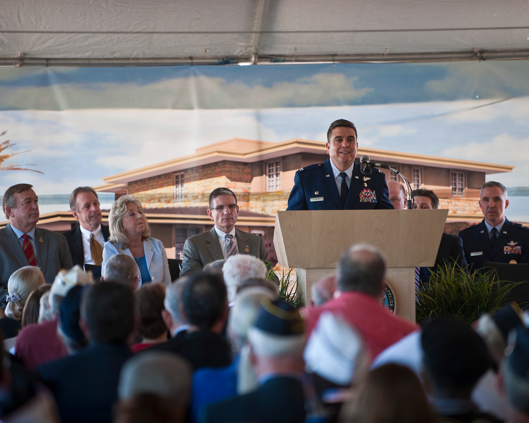 Col. (Dr.) Guillermo Tellez, 99th Medical Group commander, speaks at the Fisher House ground breaking ceremony at the Department of Veterans Affairs Southern Nevada Healthcare System campus in Las Vegas March 27, 2015. The Fisher House will be located on the VA’s campus and will feature 16 suites with private bedrooms and baths. (U.S. Air Force photo by Staff Sgt. Siuta B. Ika)