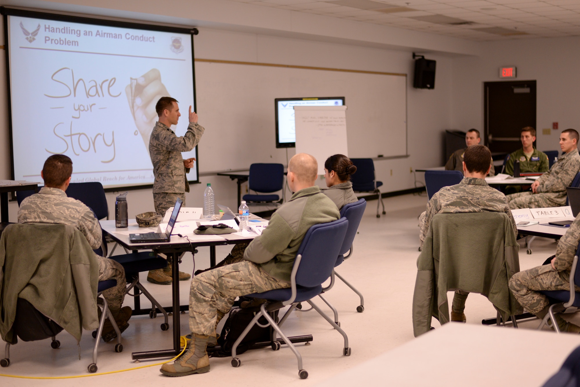 Lt. Col. Nick Leonelli, 2nd Air Refueling Squadron commander, shares his experiences with company grade officers during the Air Mobility Command Flight Commander and Officer-in-Charge Leadership Development Program beta course at the Timmermann Center on Joint Base McGuire-Dix-Lakehurst, N.J., March 24, 2015. The joint base was one of three bases selected for a trial run of the course which  focuses on creating a new and standardized way of training company grade officers in those positions. (U.S. Air Force photo by Airman 1st Class Tara A. Williamson/Released)