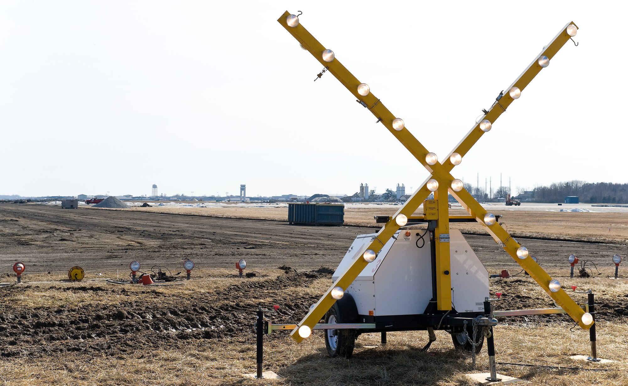 A flashing "X" sits at the approach end of runway 01-19 March 9, 2015, at Dover Air Force Base, Del. This light is to signal to approaching aircraft that the runway is closed. (U.S. Air Force photo by Roland Balik)