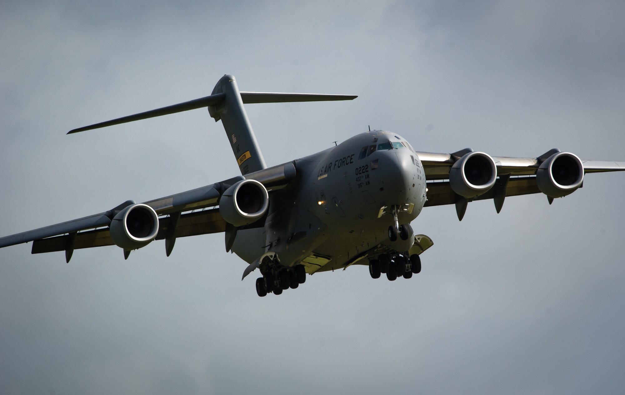 A C-17 Globemaster II from the 315th Airlift Wing in Charleston, S.C., approaches Leeuwarden Air Base, Netherlands, March 30, 2015. The C-17 delivered equipment for the upcoming deployment of F-15C Eagles from the Florida Air National Guard. The F-15s will be the second theater security package to arrive in Europe this year in support of Operation Atlantic Resolve. (U.S. Air Force photo/ Staff Sgt. Ryan Crane)