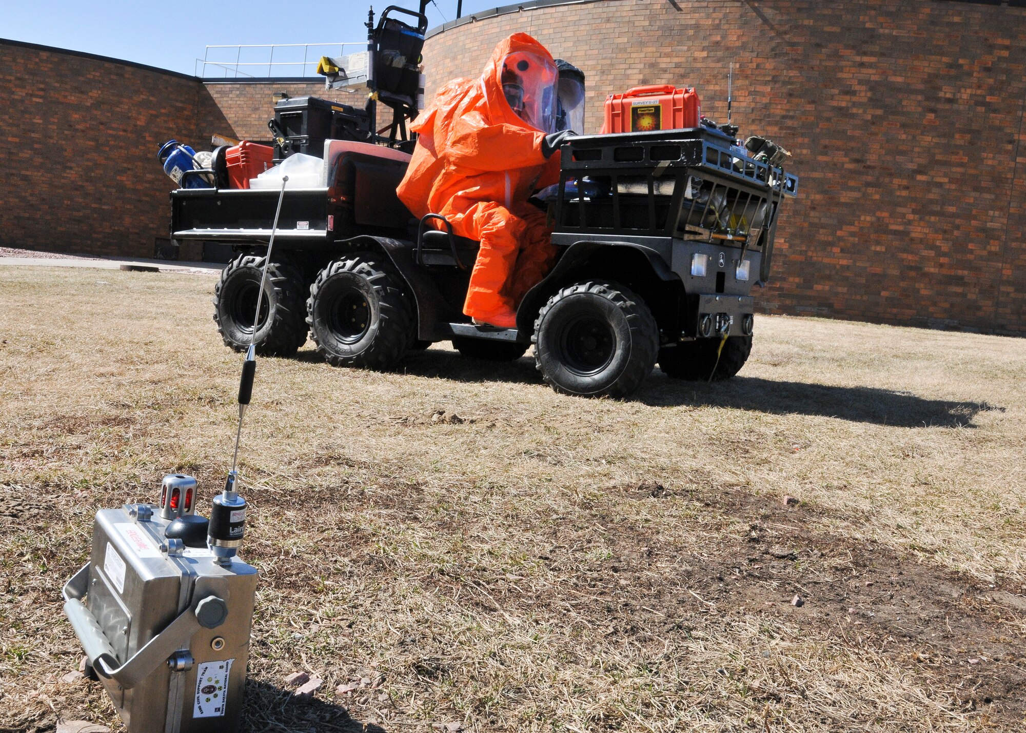 Survey team members Sgt. Kelley Trebesch and Spc. Patrick Moran, 82nd Civil Support Team (WMD), deploy AreaRAE Steel monitors which provide real-time wireless measurements for a range of potential threats at the exercise incident site in Sioux Falls, S.D., March 19, 2015. The 82nd CST primarily uses the AreaRAE to monitor Hydrogen Sulfide (H2S), Lower Explosive Limit (LEL) to see if the air could be a flammable environment, Carbon monoxide (CO), Oxygen (O2) to make sure the air can sustain life, and gamma radiation.(National Guard photo by Staff Sgt. Luke Olson/Released)