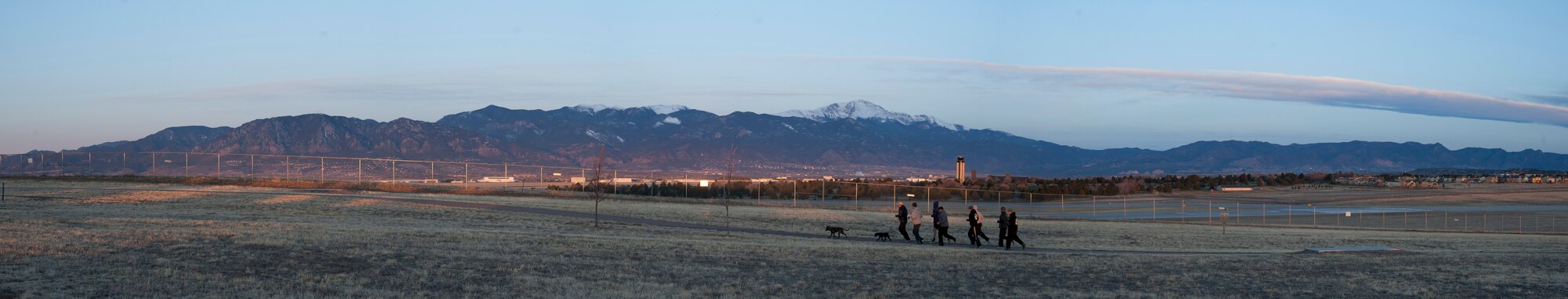 PETERSON AIR FORCE BASE, Colo. -- A group of tactical air control party Airmen from the 13th Air Support Operations Squadron complete a lap around a mile-long course during the fourth annual 24-hour Tactical Air Control Party Awareness Run at Peak View Park on Peterson AFB, March 26. The purpose of the run was to raise awareness and generate donations for the TACP Association. The money generated by this event helps to support the families of fallen TACP members as well as disabled TACP Airmen. (U.S. Air Force photo illustration by Staff Sgt. J. Aaron Breeden)