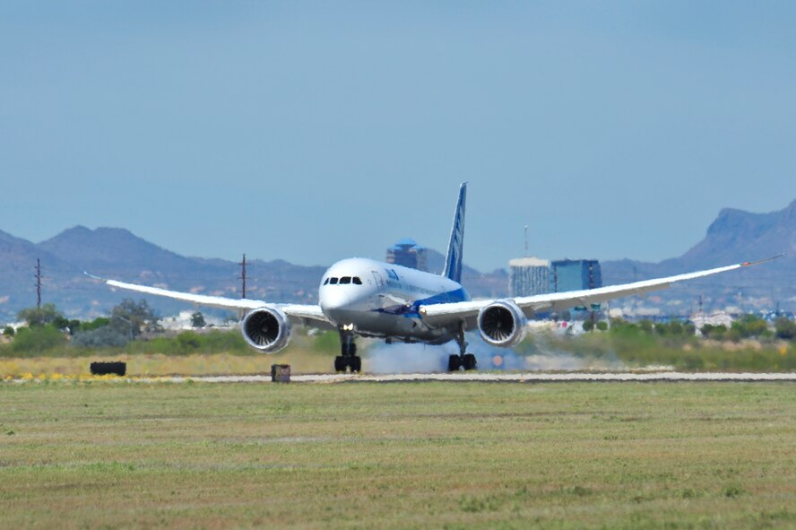 A Boeing 787-8 Dreamliner lands on the runway at Davis-Monthan Air Force Base, Ariz., March 26, 2015.  After landing, the Dreamliner was defueled and towed to the Pima Air & Space Museum.  (U.S. Air Force photo by Airman 1st Class Chris Massey/Released)