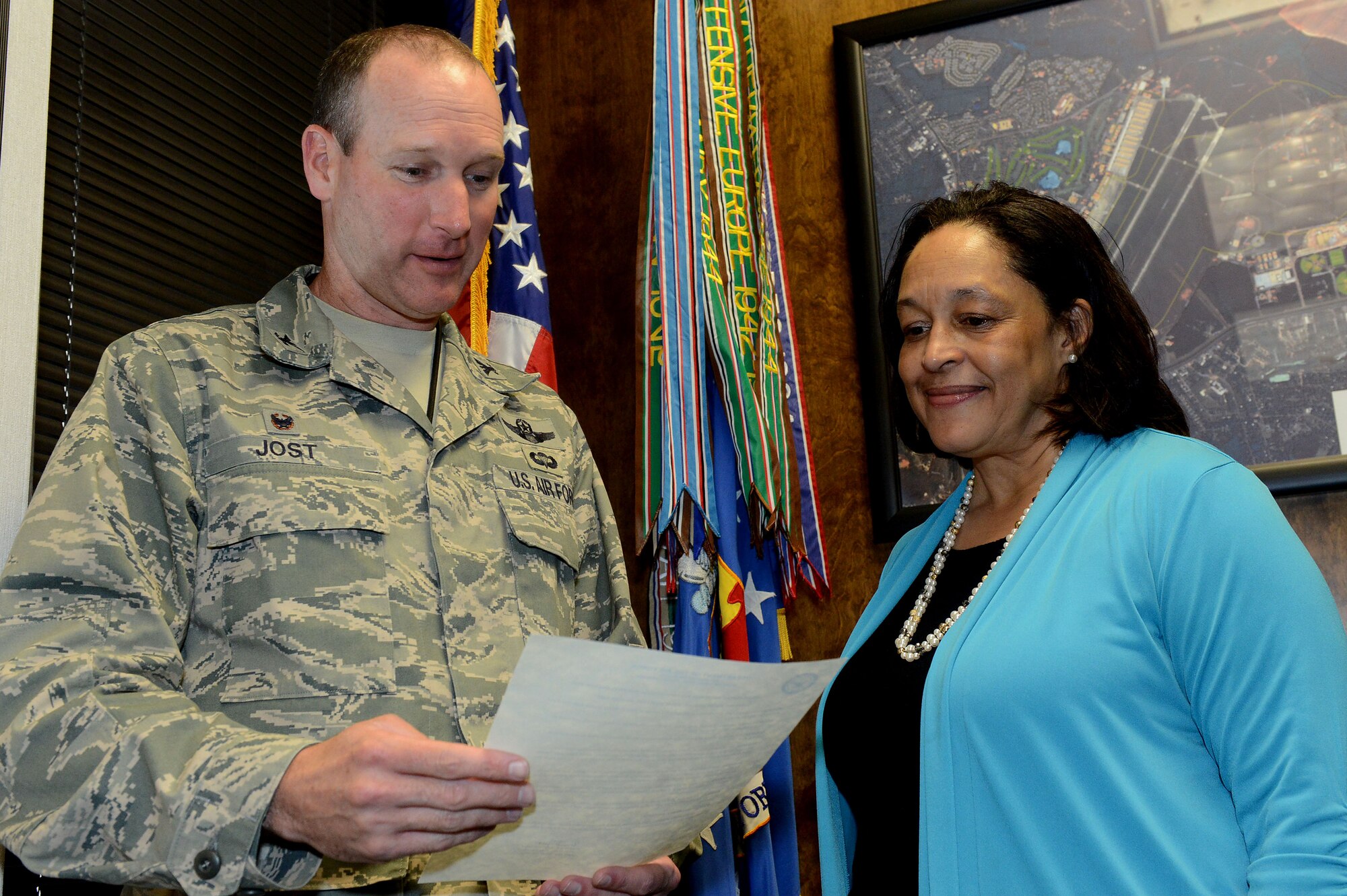 U.S. Air Force Col. Stephen Jost, 20th Fighter Wing commander, reads the Sexual Assault Awareness and Prevention Month proclamation out loud with Cynthia Evans, 20th FW Sexual Assault Prevention and Response chief and Sexual Assault Response Coordinator, to kick-off the beginning of SAAPM at Shaw Air Force Base, S.C., March 23, 2015. April is SAAPM, and this year’s theme is “Eliminate Sexual Assault: Know Your Part. Do Your Part.” (U.S. Air Force photo by Senior Airman Diana M. Cossaboom/Released)