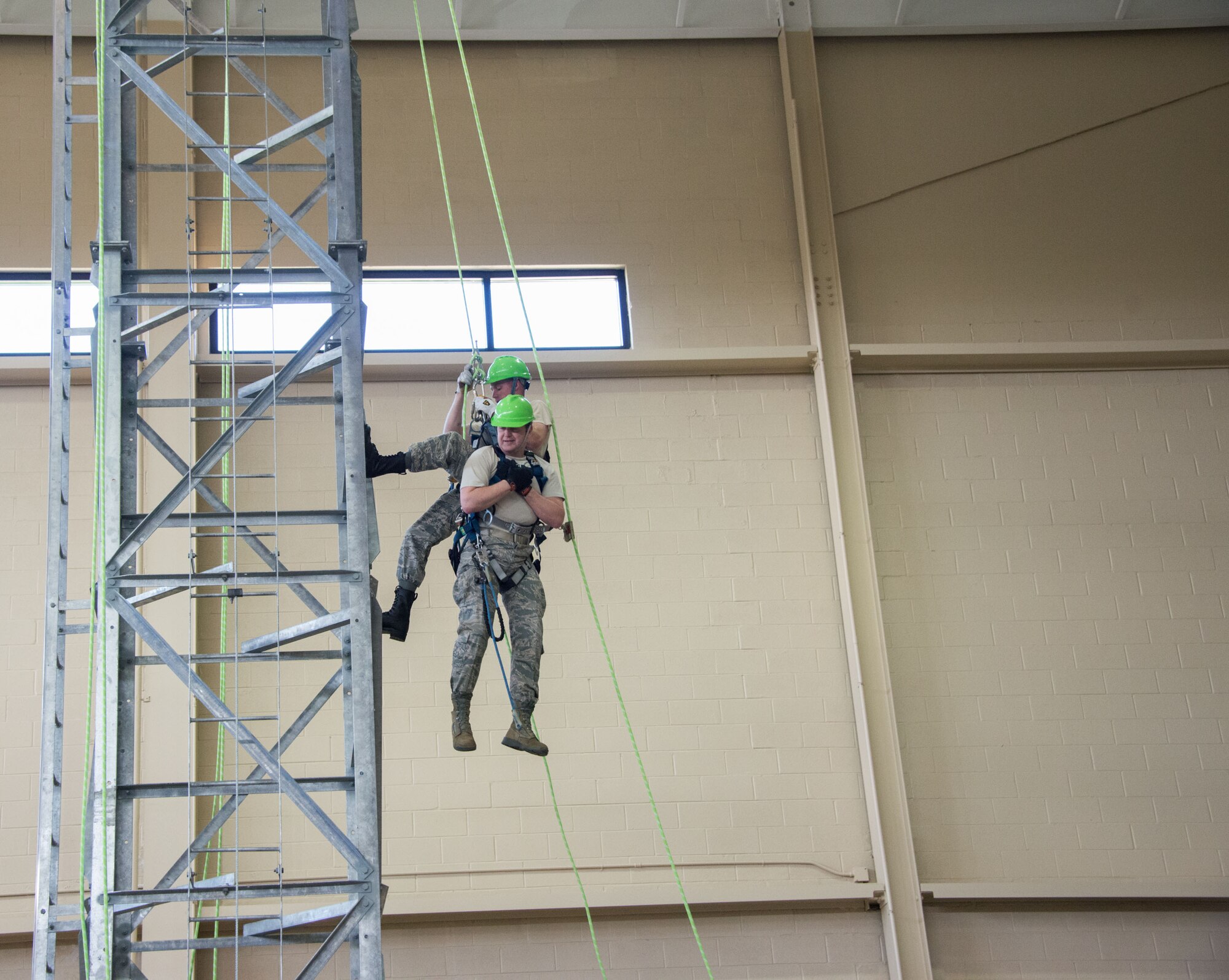 Lt. Gen. Stephen Hoog, Air Force Assistant Vice Chief of Staff, volunteered to demonstrate a 338th Training Squadron tower rescue for the International Air Attaché visit at Matero Hall March 25, 2015, at Keesler Air Force Base, Miss. The purpose of the 2015 Air Attaché Spring Tour was to provide these diplomatically accredited international attachés with a view of military, industrial, cultural and social aspects of the United States and facilitate the development of cordial relations. (U.S. Air Force photo by Marie Floyd)