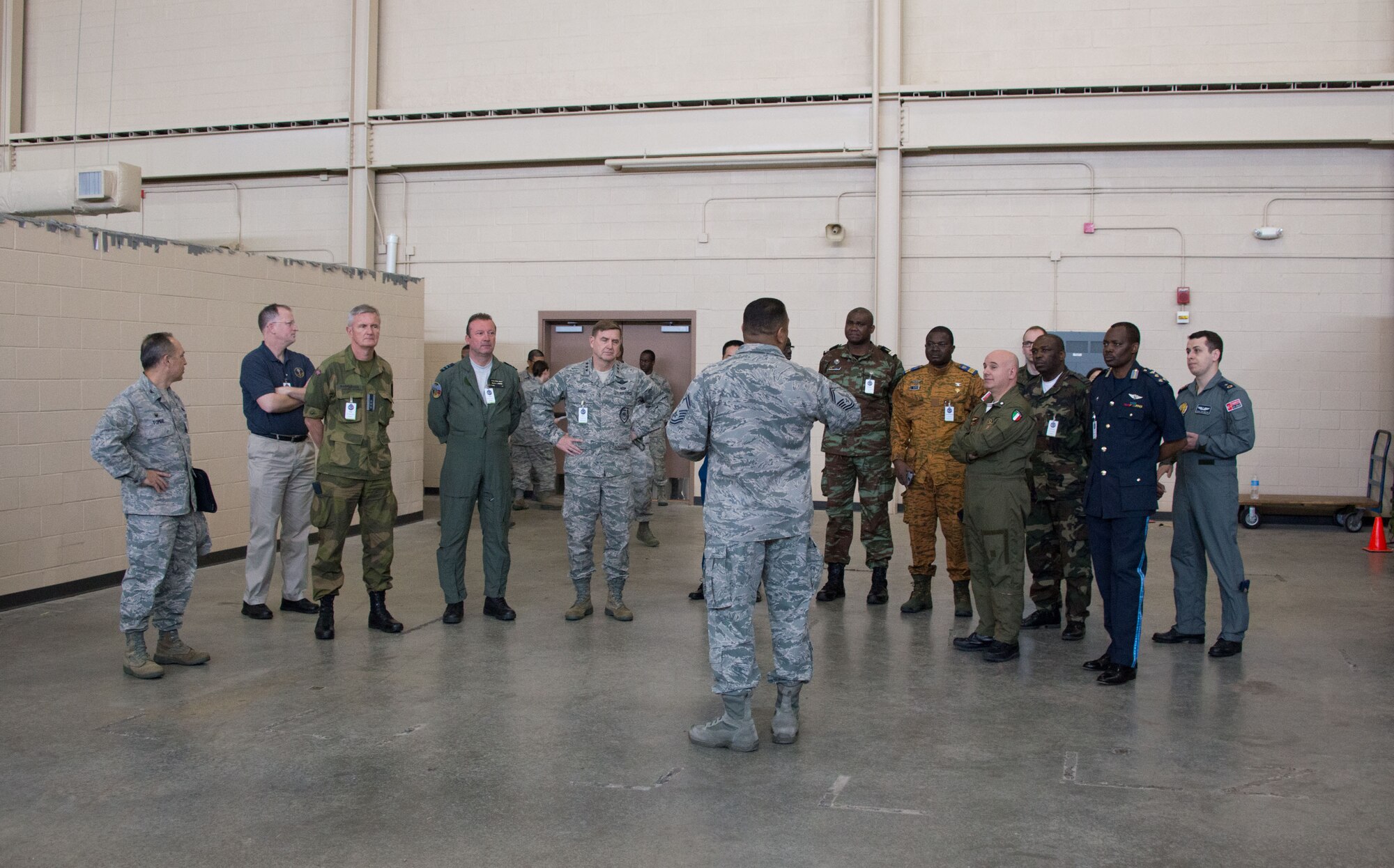 Members of the International Air Attaché receive a briefing on tower climbing in Matero Hall from the 338th Training Squadron March 25, 2015, at Keesler Air Force Base, Miss. The purpose of the visit was to provide these diplomatically accredited international attachés with a view of military, industrial, cultural and social aspects of the United States and facilitate the development of cordial relations. (U.S. Air Force photo by Marie Floyd)