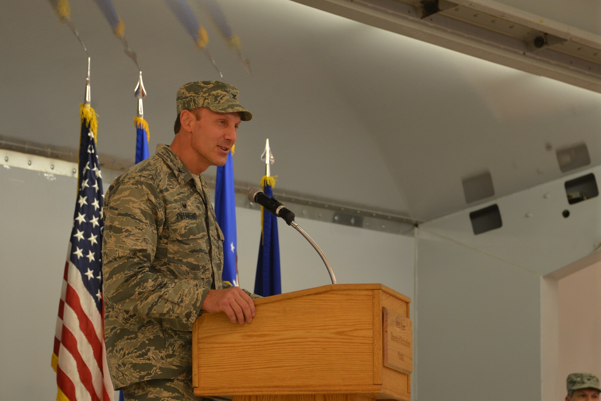 Col David Piffarerio, 477th Fighter Group commander, addresses the Fighter Group for the first time as the newly assigned commander. Piffarerio took command of the group during a Change of Command Ceremony held here. (US Air Force photo by Tech. Sgt. Dana Rosso)