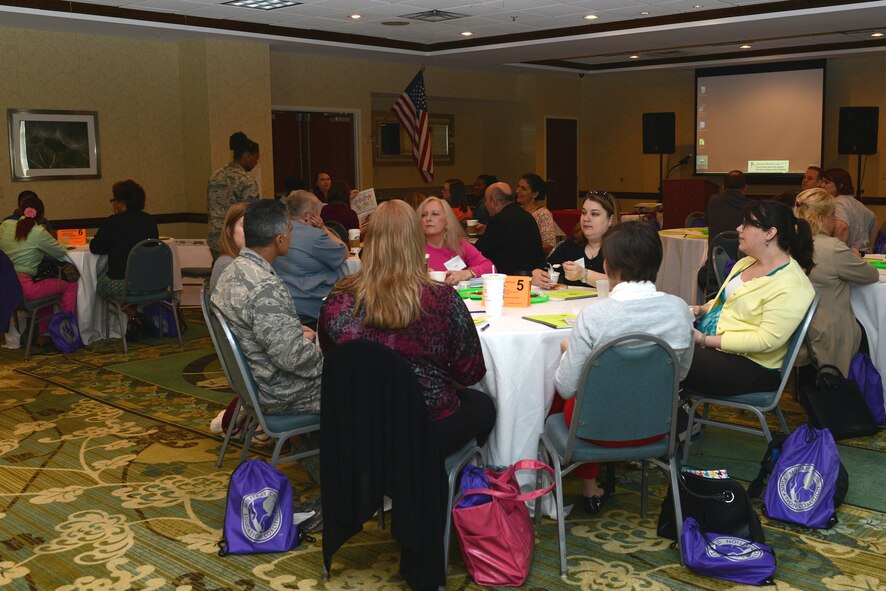 Participants wait for the Living in the New Normal Institute to begin March 25, 2015, at a hotel in Valdosta, Ga. The two-day institute outlined community resources, deployment information and strategies to help children build resiliency. (U.S. Air Force photo by Airman 1st Class Kathleen D. Bryant)