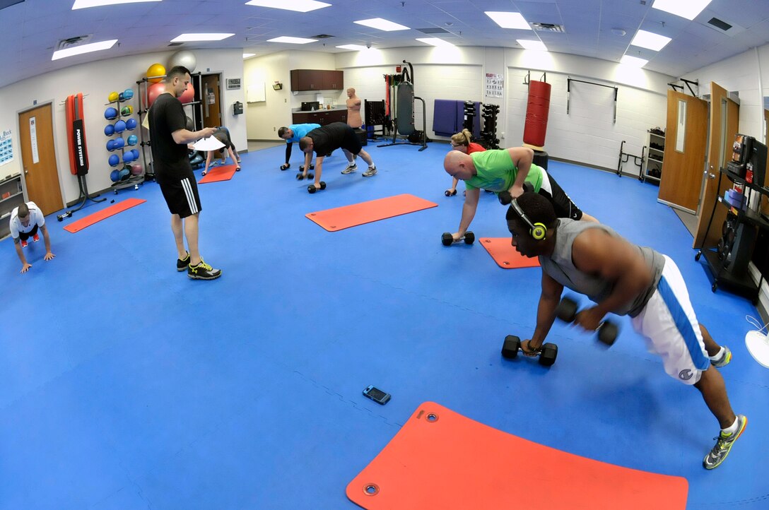 MCGHEE TYSON AIR NATIONAL GUARD BASE, Tenn. - More than a half-dozen Airmen joined in an afternoon intensity cardio-class in Wilson Hall here March 30, 2015, for the I.G. Brown Training and Education Center's fitness program.  (U.S. Air National Guard photo by Master Sgt. Mike R. Smith/Released) 