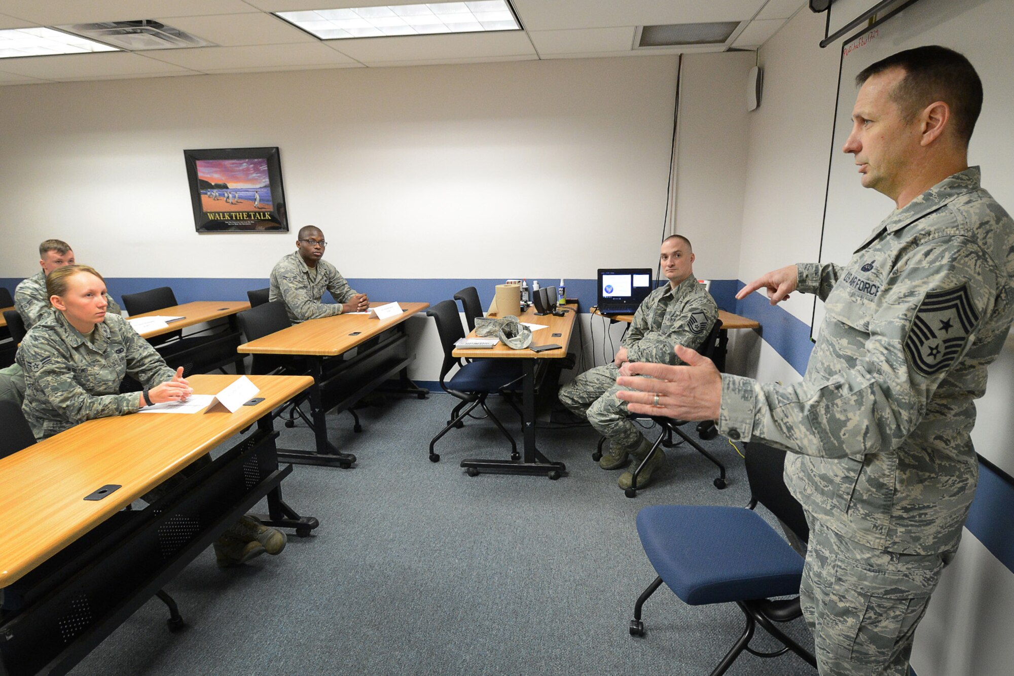 Hanscom Command Chief Master Sgt. Craig A. Poling speaks with Airmen during a First Term Airman Center at the base Education Center, Mar. 30. Personnel from Hanscom, as well as the 6th Space Warning Squadron located at Joint Base Cape Cod, Mass., attended the five-day course. The purpose of the class is to help Airmen transition from the training environment to the active Air Force. Among the topics the course covers are: Managing personal finances, resiliency, suicide prevention and substance abuse education and prevention. (U.S. Air Force photo by Jerry Saslav)