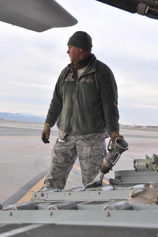 HILL AIR FORCE BASE, Utah – Air Force Reserve Tech. Sgt. Tom Kocis, a 910th Airlift Wing Aerial Spray Maintainer, prepares to connect a hose to a Modular Aerial Spray System (MASS) aboard a modified C-130H Hercules tactical cargo aircraft, assigned to the 910th based at Youngstown Air Reserve Station, Ohio, on the flightline here in preparation for an aerial spray sortie, March 17, 2015. Kocis and other members of the 910th’s Aerial Spray Maintenance Flight are loading the aircraft’s MASS with a herbicide which was sprayed over the nearby Utah Test and Training Range (UTTR), eliminating unwanted ground covering weeds which can obscure target sites and Unexploded Ordinance (UXO) on bombing ranges. The 910th Airlift Wing is home to the Department of Defense’s (DoD) only large-area fixed wing aerial spray capability and dedicated aerial spray maintenance flight. U.S. Air Force photo by Master Sgt. Bob Barko Jr.