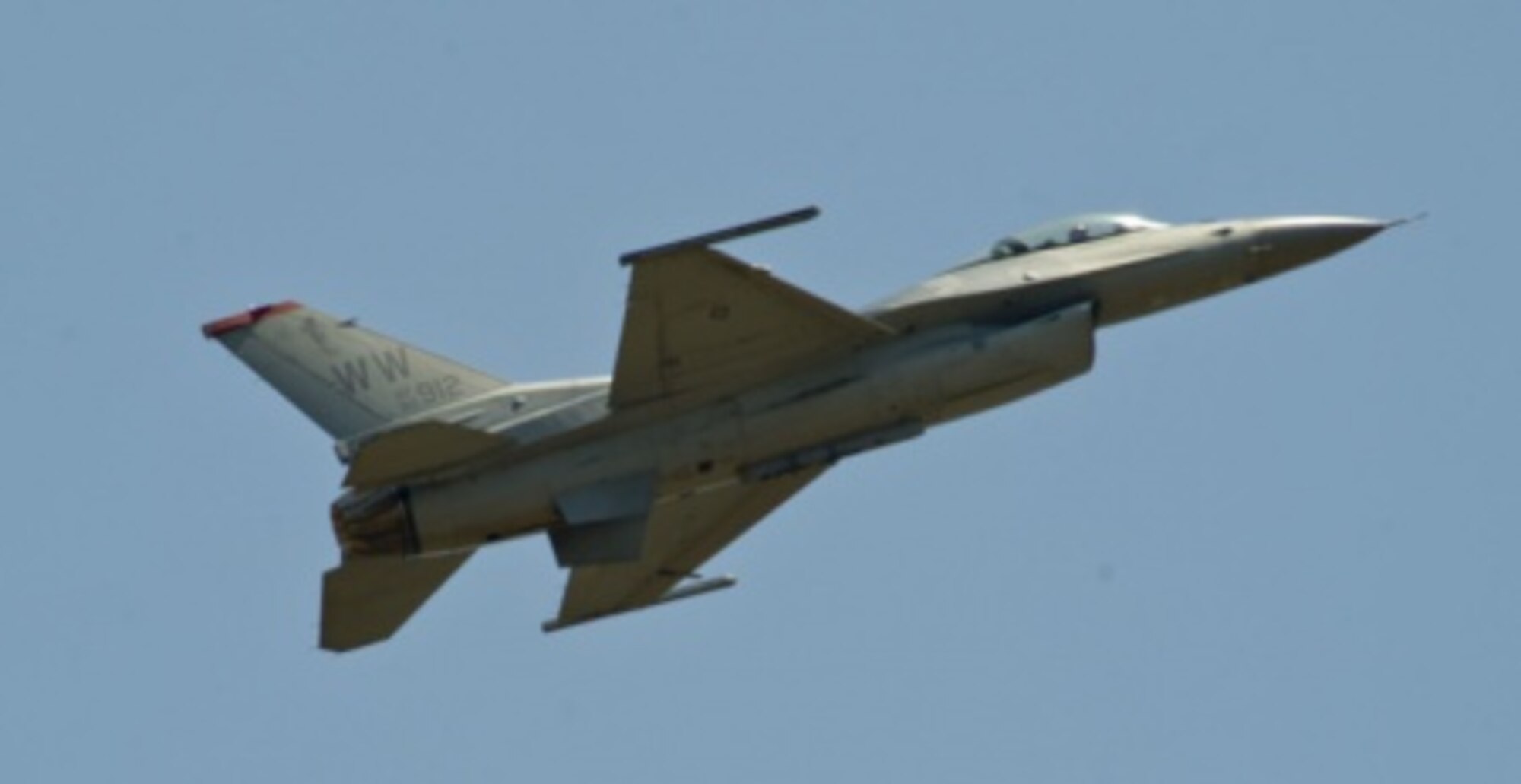 An F-16 Fighting Falcon, flown by Capt. Austin Brown, a Pacific Air Forces’ F-16 Demonstration Team, flies through the air above the flightline at Langkawi International Airport, Malaysia, March 17, 2015. The U.S. demonstration team joined more than 60 countries for the Langkawi International Maritime and Aerospace Exhibition ‘15. Participating in the LIMA ‘15 airshow demonstrates the U.S. Air Force’s dedication to strengthening relations with Malaysia. (U.S. Air Force photo by Tech. Sgt. Terri Paden/RELEASED)