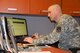Sgt. Jerimey Podwys, 35th Air Defense Artillery Brigade senior Local Area Network manager, establishes new user accounts for Soldiers recently assigned to the brigade
March 30, 2015 at Osan Air Base, Republic of Korea.
