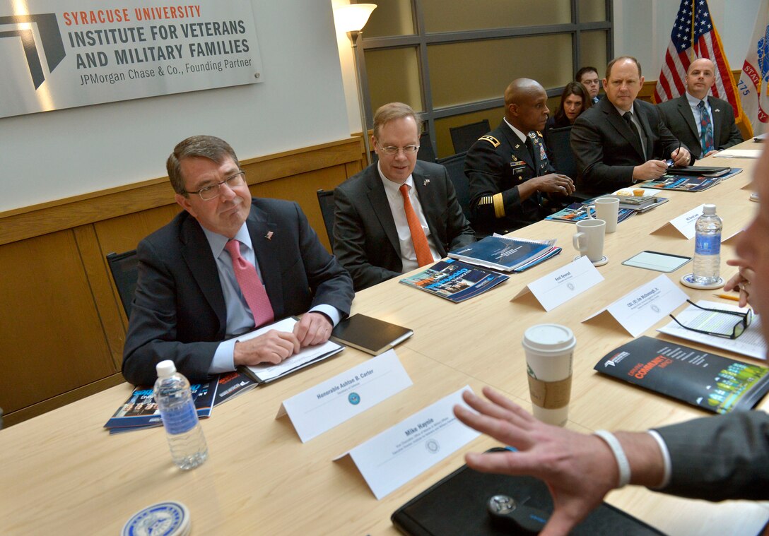 Defense Secretary Ash Carter meets with Mike Haynie, executive director of the Institute for Veterans and Military Families, at Syracuse University, Syracuse, N.Y., March 31, 2015. 