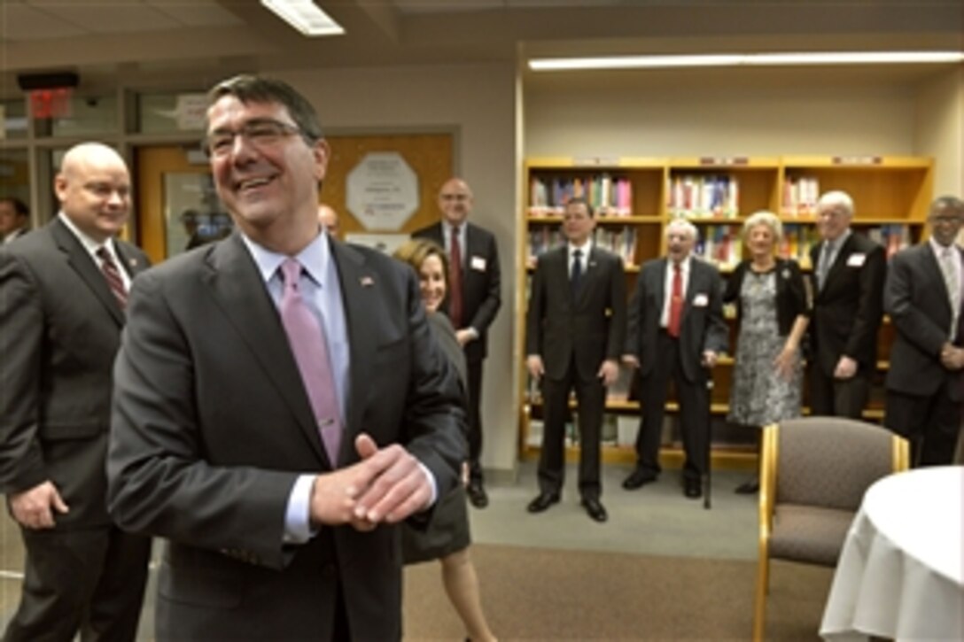 Defense Secretary Ash Carter receives an enthusiastic greeting as he returns to his high school alma mater, Abington Senior High School in Abington, Pa., March 30, 2015. Carter, who graduated from the school in 1972, delivered remarks to students, kicking off a national discussion about building "the force of the future" and what the Defense Department must do to maintain its superiority well into the 21st century.