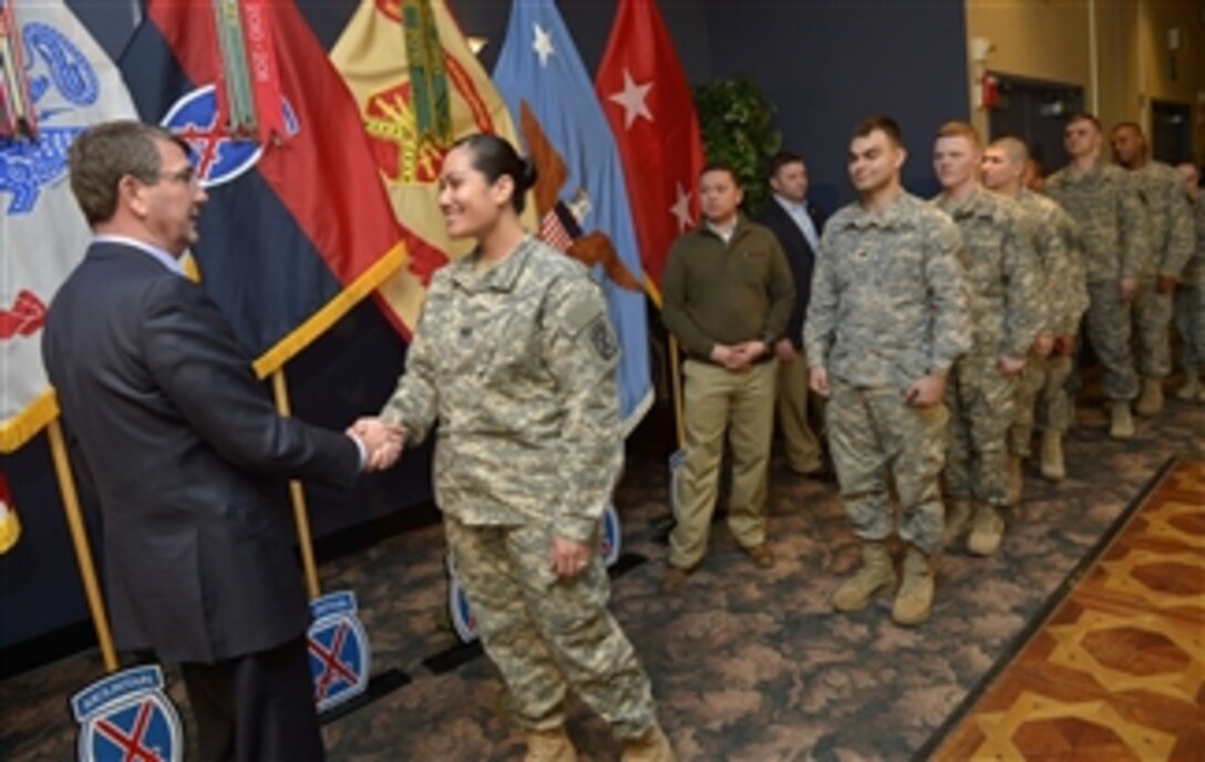 Defense Secretary Ash Carter shakes soldiers' hands on Fort Drum, N.Y., after delivering remarks, March 30, 2015. Carter traveled to the base as a part of his Force of the Future initiative.