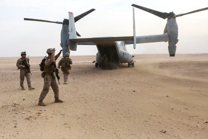 U.S. Marines with 2nd Battalion, 7th Marine Regiment, Special Purpose Marine Air Ground Task Force – Crisis Response – Central Command, board an MV-22 Osprey tiltrotor aircraft after recovering a simulated downed pilot during a Tactical Recovery of Aircraft and Personnel drill in the Central Command area of operation, March 8, 2015.  TRAP missions are conducted by teams of Marines and sailors to rescue or extract downed personnel or aircraft in the event of an in-flight emergency during combat operations. (U.S. Marine Corps photo by Cpl. Tony Simmons/Released)