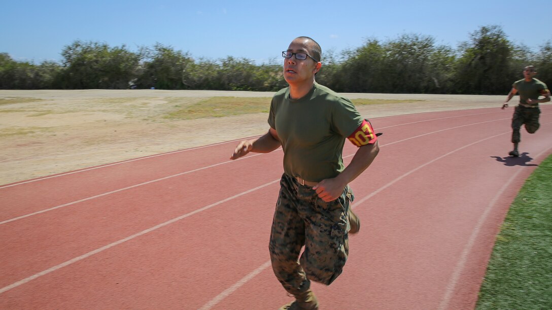 Private First Class Mark-Louie H. Taocta, Platoon 1007, Alpha Company, 1st Recruit Training Battalion, leads the way during the half-mile sprint of the Combat Fitness Test at Marine Corps Recruit Depot San Diego, April 9.  During receiving week, it was discovered that Taocta had a medical condition that pulled him out of training, and he was sent to Marine Rehabilitation Platoon for three months of observation.