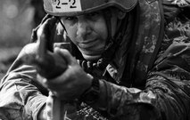 Matthew Gilstad, a Tactical Air Control Party candidate from Falcon 98, looks down the sight of his weapon during a field training exercise at Eglin Range, Fla., March 23, 2015. TAC-P candidates from Falcon 98 are the last class to graduate from Hurlburt Field, Fla., before the schoolhouse moves to Lackland Air Force Base, Texas. (U.S.  Air Force photo/Senior Airman Christopher Callaway)