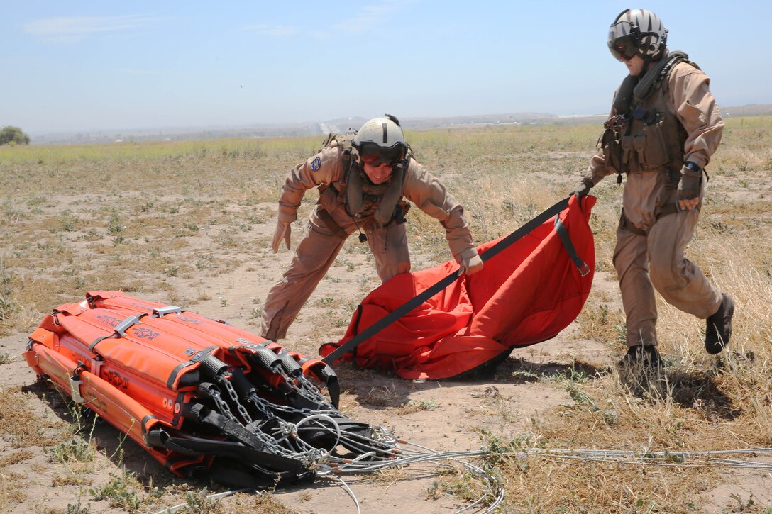 Marines with Marine Medium Tiltrotor Squadron 163, 3rd Marine Aircraft Wing, participated in Camp Pendleton’s annual Wildland Firefighting Exercise at Las Pulgas Lake, Apr. 30. The Marines manned the MV-22 Osprey flying from Marine Corps Air Station Miramar to assist in the joint exercise which provides ready, trained and certified military and civilian resources to combat wild land fires in the region. Aviation and ground units from Camp Pendleton, 3rd MAW, Navy Region Southwest, the California Department of Forestry and Fire Protection, and the San Diego Sheriff’s Department participated in the exercise.