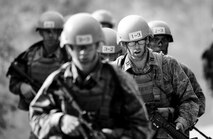 Tactical Air Control Party candidates from Falcon 98 march back to their base during a field training exercise at Eglin Range, Fla., March 24, 2015. TAC-P candidates from Falcon 98 are the last class to graduate from Hurlburt Field, Fla., before the schoolhouse moves to Lackland Air Force Base, Texas. (U.S.  Air Force photo/Senior Airman Christopher Callaway)