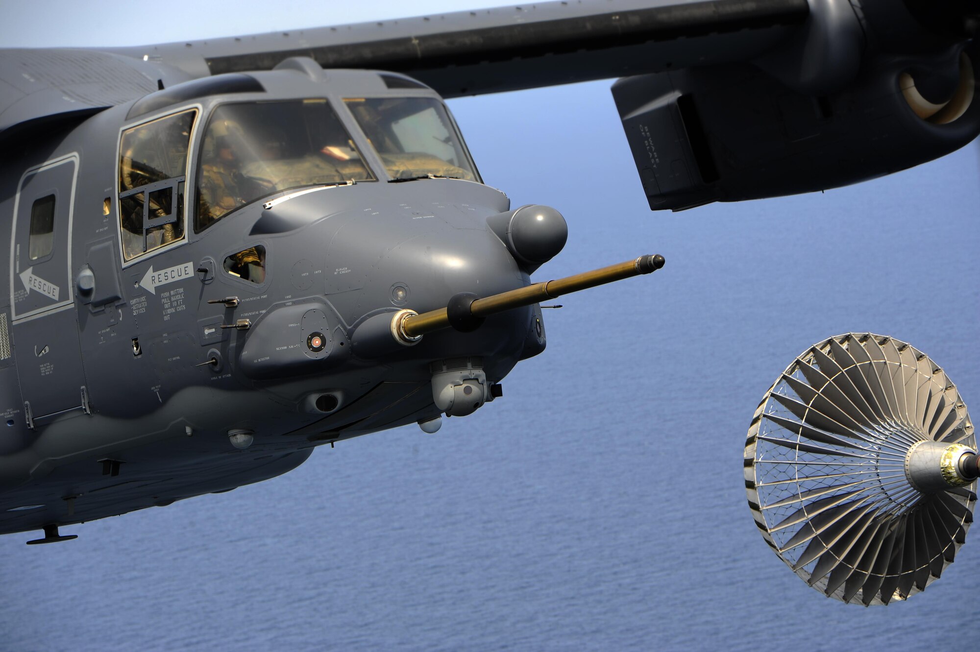 A CV-22 Osprey approaches an MC-130H Combat Talon II air-refueling receptacle during a training mission at Hurlburt Field, Fla., April 24, 2015. The Osprey is a tiltrotor aircraft that combines the vertical takeoff, hover and vertical landing qualities of a helicopter with the long-range, fuel efficiency and speed characteristics of a turboprop aircraft. (U.S. Air Force photo/Senior Airman Christopher Callaway)