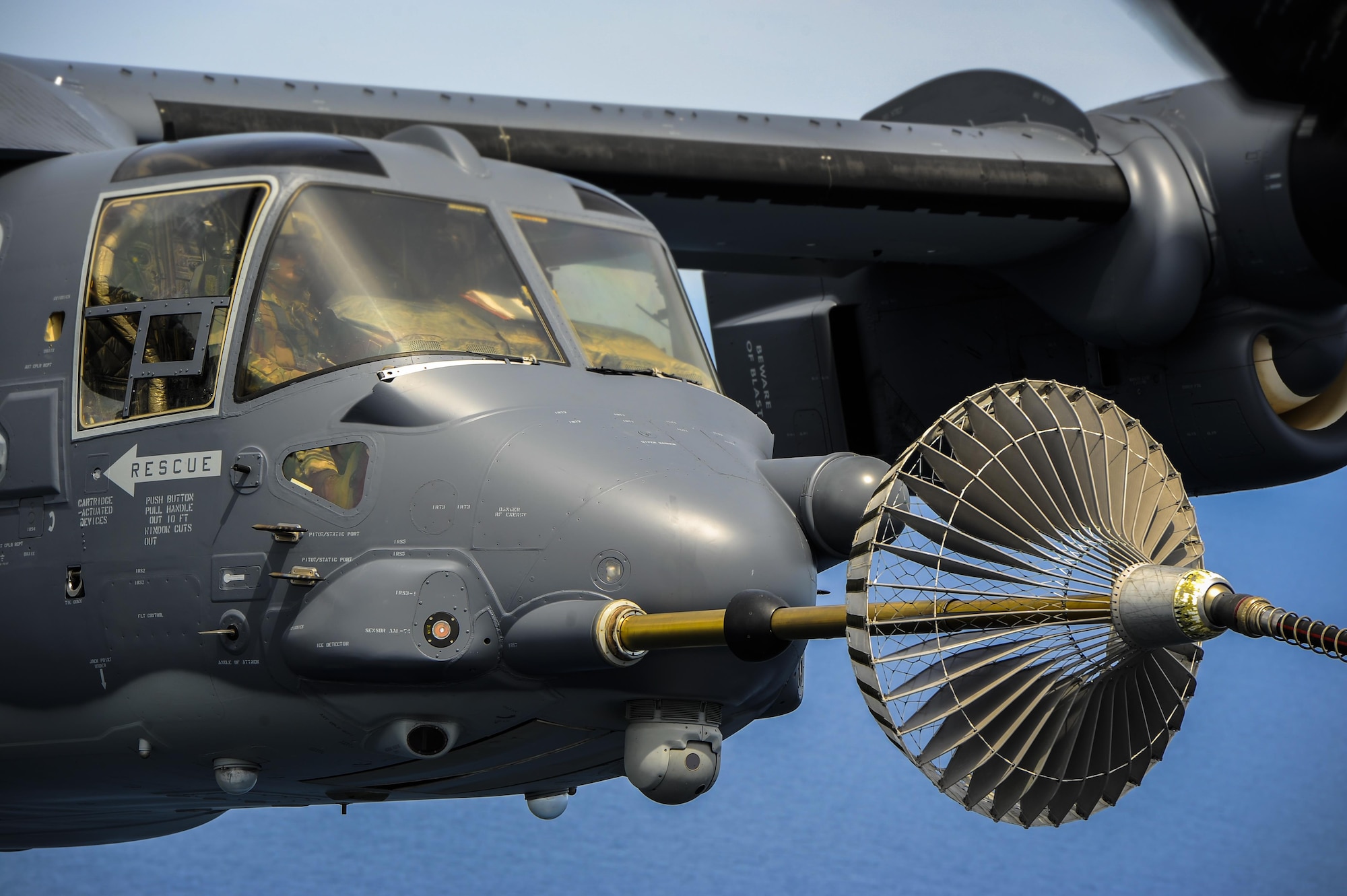 A CV-22 Osprey connects to an MC-130H Combat Talon II air-refueling receptacle during a training mission at Hurlburt Field, Fla., April 24, 2015. The Osprey is a versatile, self-deployable aircraft that offers increased speed and range over other rotary-wing aircraft, enabling Air Force Special Operations Command aircrews to execute long-range special operations missions. (U.S. Air Force photo/Senior Airman Christopher Callaway)