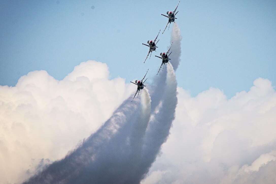 The Thunderbirds’ Thunder Diamond formation performs the Diamond Bottom Up Pass maneuver during a practice show at Lakeland, Fla., April 24, 2015. (U.S. Air Force photo/Tech. Sgt. Manuel J. Martinez)