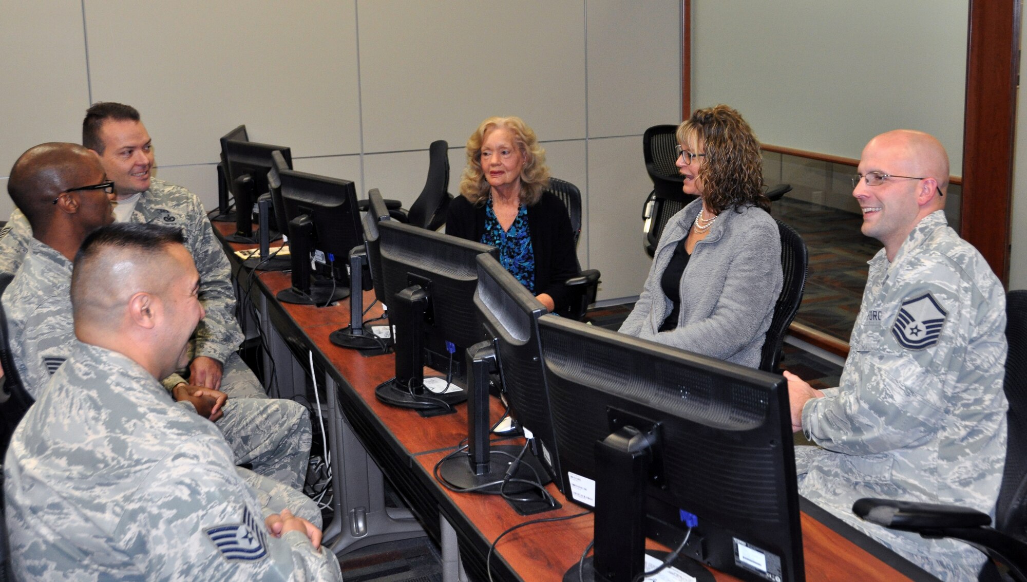 Members from the Air Reserve Personnel Center change agent network discuss updates on different change initiatives within the center and work toward solutions April 29, 2015, on Buckley Air Force Base, Colo. The sponsors are a conduit between ARPC members and leadership to collaborate, influence and change the center from comments received from center professionals. The team’s purpose is to ensure changes within the center deliver intended results and outcomes by addressing one of the most critical elements of successful change: the people. Their mission is to involve ARPC employees with the design of effective communication and training materials for various change initiatives. (U.S. Air Force photo/Staff Sgt. Adam Van Horn)