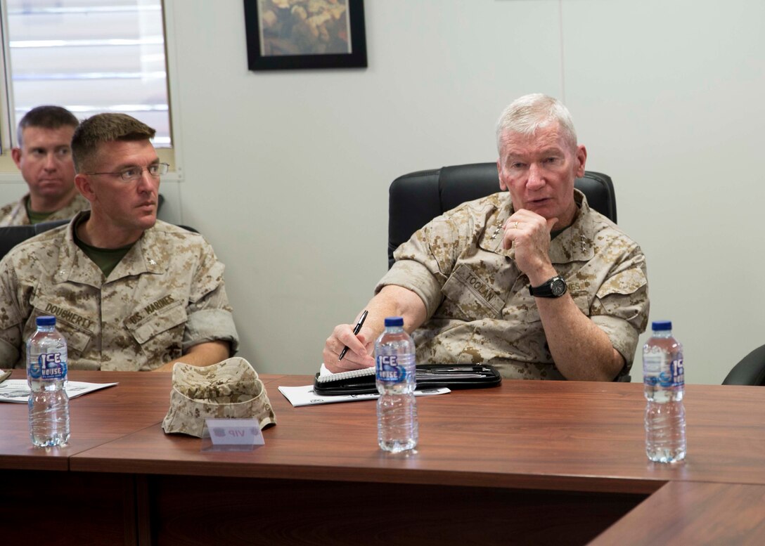 Lieutenant General John A. Toolan, commander of U.S. Marine Corps Forces, Pacific, discusses the capabilities of Marine Rotational Force – Darwin with the assembly of Marines, as Lt. Col. Eric J. Dougherty, commanding officer of 1st Battalion, 4th Marines, MRF-D, looks on, April 27 at Robertson Barracks, Palmerston, Australia. Toolan addressed the employment of MRF - D in response to humanitarian assistance operations and peace keeping operations in the Pacific region. MRF-D is the deployment of U.S. Marines to Darwin and the Northern Territory, for approximately six months at a time, where they will conduct exercises and training on a rotational basis with the Australian Defence Forces.