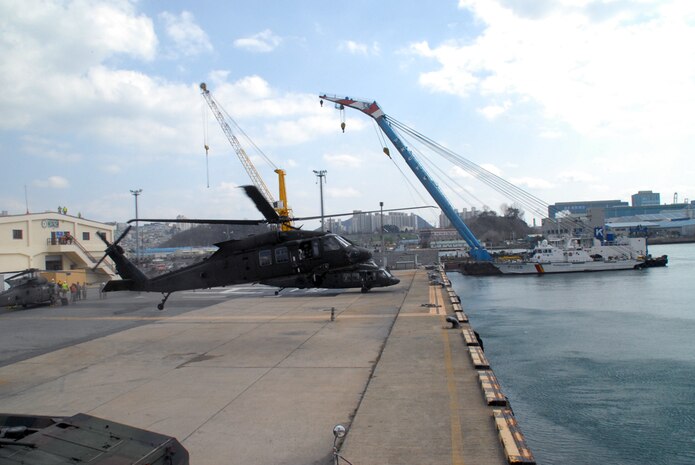 In this photo file, the 837th Transportation Battalion, stationed at Pier 8 in Busan, South Korea, offloads the USNS Pfc. Eugene A. Obregon March 5-9, the same time it provides support for the Combined Seaport Coordination Center during set up for Key Resolve.