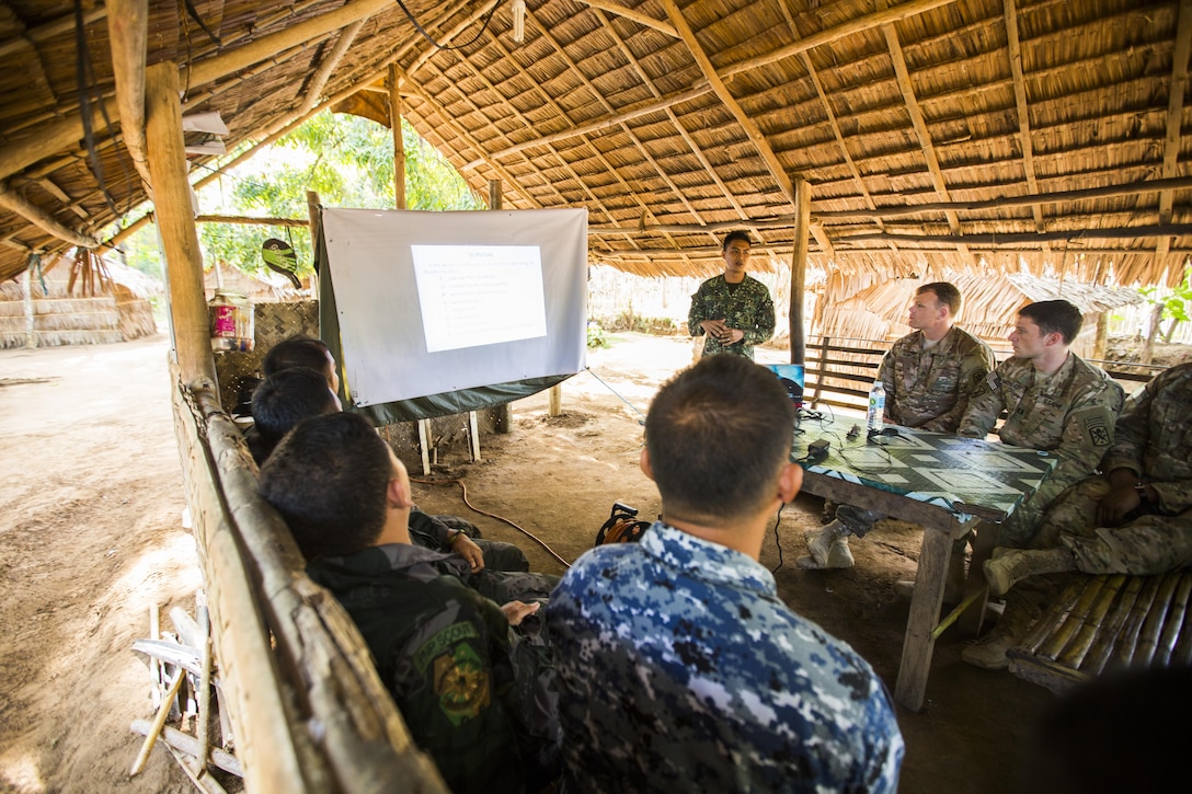 Philippine Marine Corps Cpl. Jason Tallud with Battalion Landing Team 4, 3rd Marine Brigade, instructs U.S. soldiers with Civil Affairs Team 742, Delta Company, 97th Civil Affairs Battalion and Philippine forces, during Jungle Survival training in Puerto Princesa, Philippines, during exercise Balikatan 2015, April 28. The Jungle Survival training, taught by the Philippine Marine Corps, was held to instruct military members and practice techniques to become more effective when responding to crisis in the region.